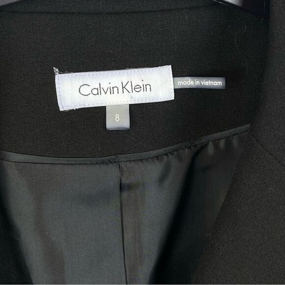 Calvin Klein Blazer Black Two Button Jacket Gold Zippered Pockets Fitted Size 8 - Picture 6 of 6